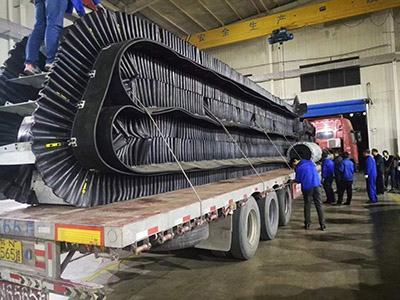 Corrugated sidewall belt